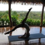A participant is practicing physical posture in Costa Rica Yoga Spa