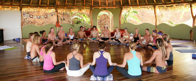 Participants are meditating together in Costa Rica Yoga Spa