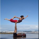couple practicing practicing partner yoga at yoga mandir