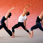 people practicing vinyasa flow yoga